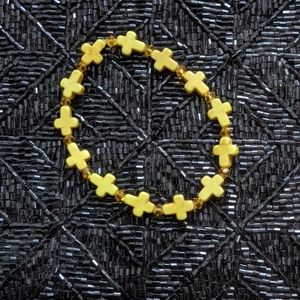 Yellow gold cross bracelet